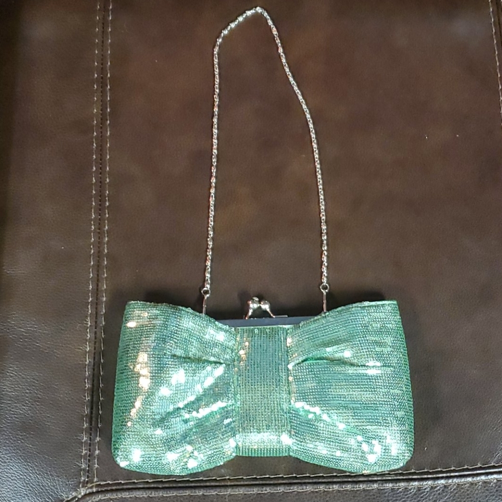 Seagreen sequin bow-style clutch with chain strap